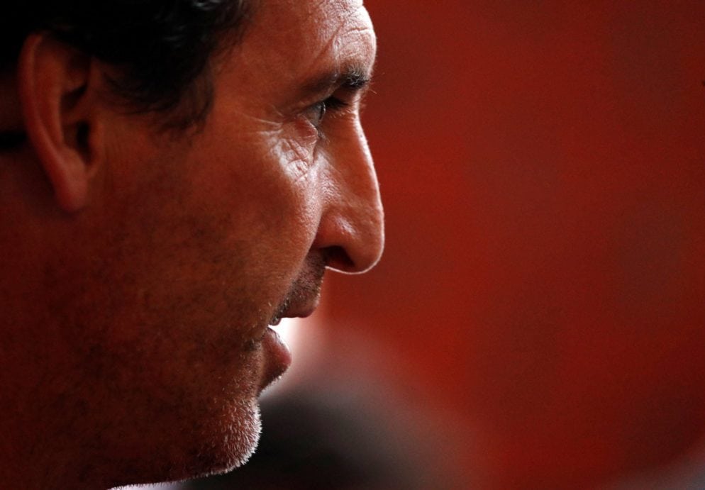 Arsenal coach Unai Emery speaks before a training session in Singapore